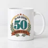 Бяла чаша с число 50, подарък и надпис На най-добрия юбиляр в света Бяла чаша с число 50, подарък и надпис На най-добрия юбиляр в света